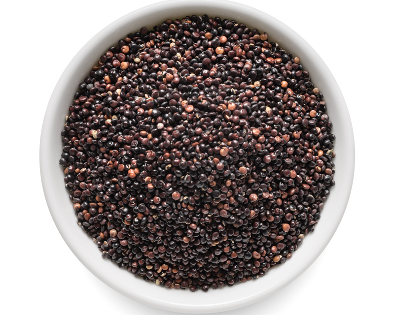 black mustard seeds in white bow