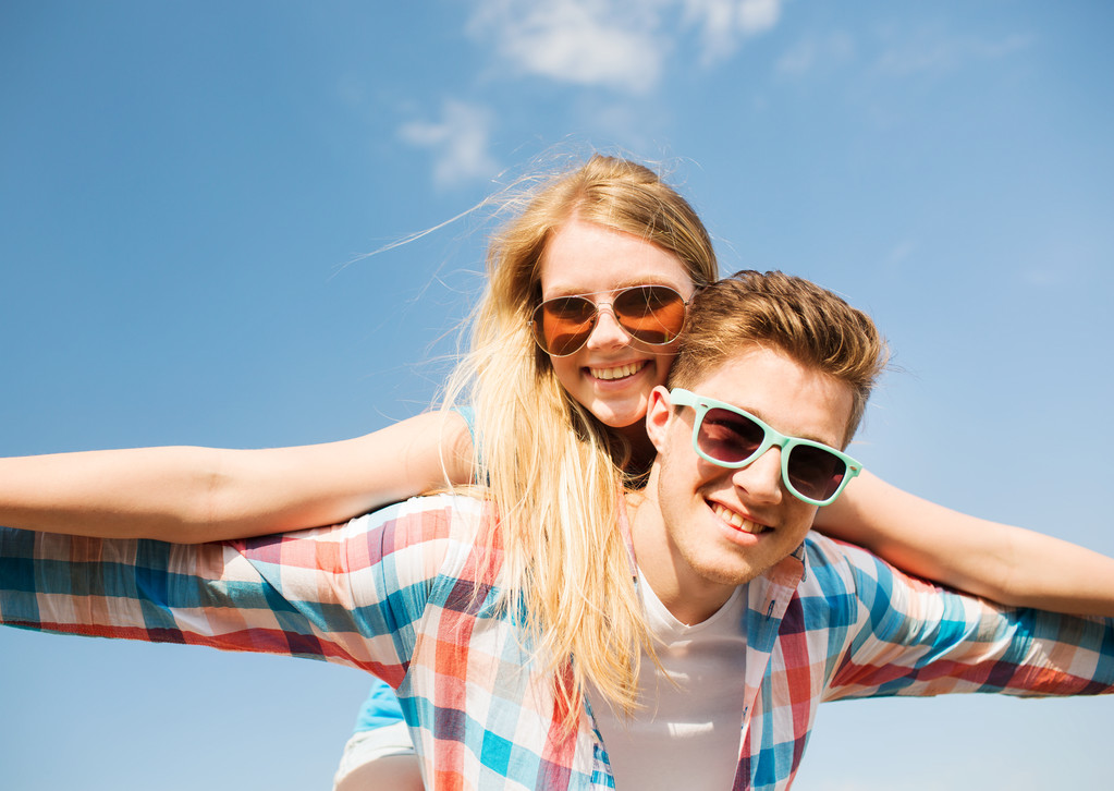 stock photo smiling couple having fun outdoors