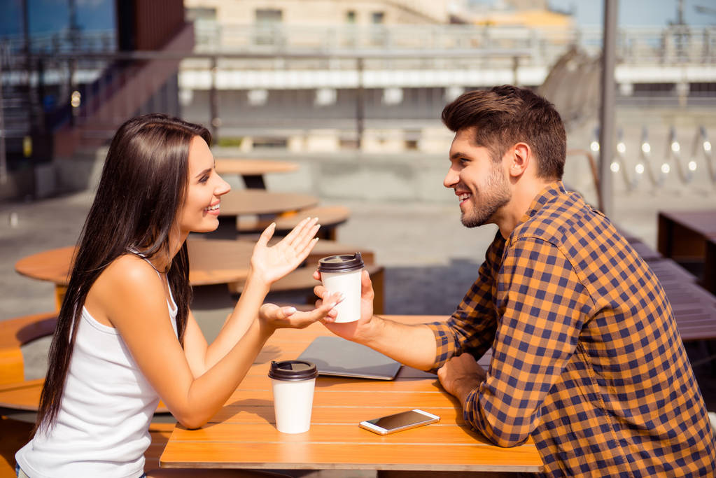 stock photo young couple having date in cafe drinking coffee and talking