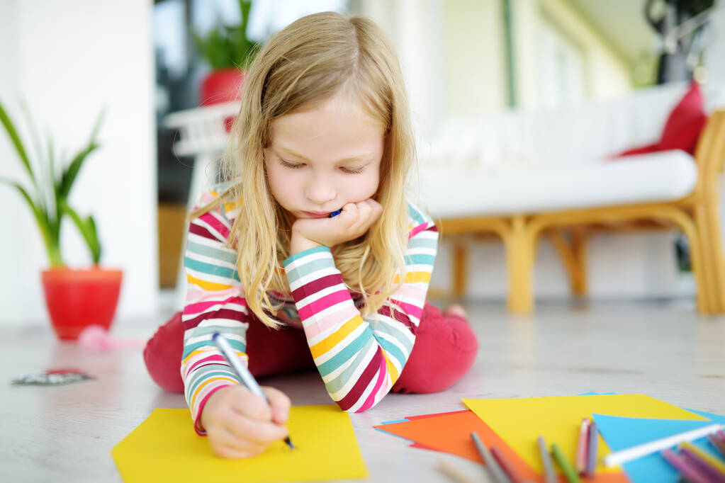 stock photo young girl drawing colorful pencils home creative kid doing crafts